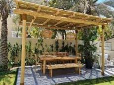 Buy Wooden Pergolas for Shade or Decorating from Gems Steel Contracting LLC in UAE,Dubai